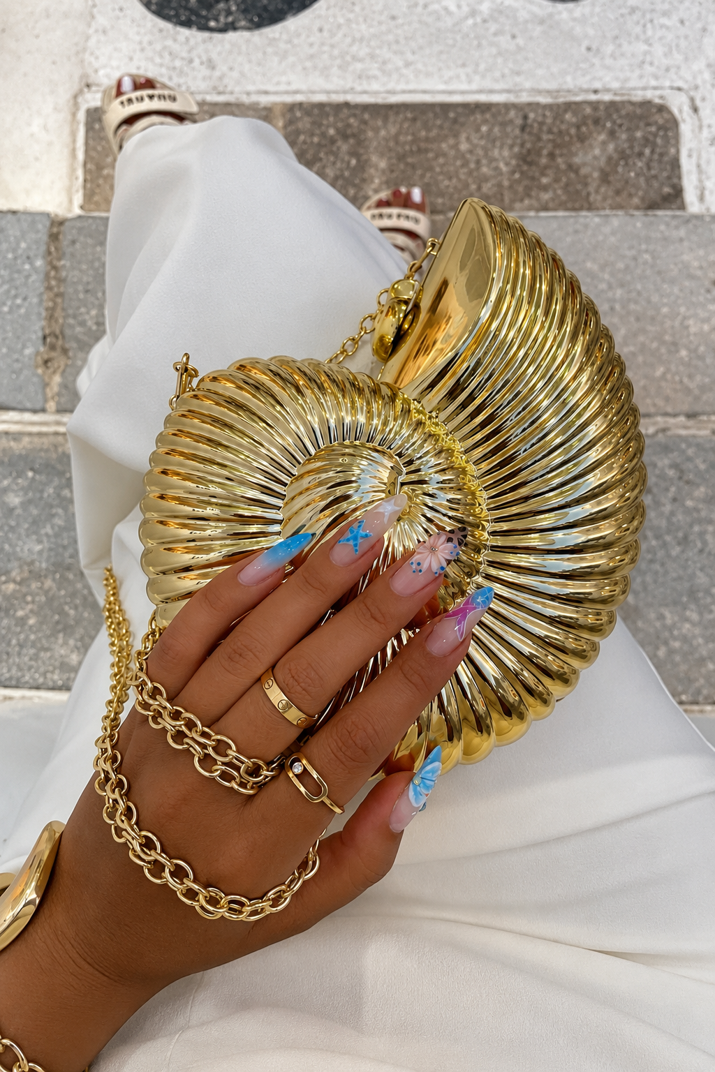 Gold Ribbed Shell Clutch Bag